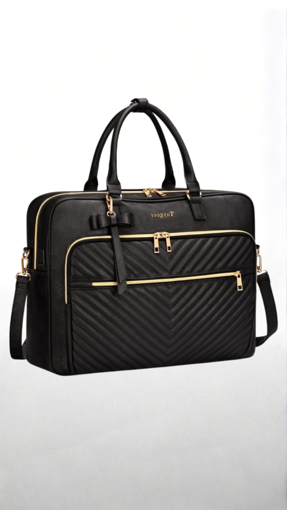 A structured black faux-leather convertible laptop bag or briefcase displayed against a plain white background. The elegant bag features a quilted chevron pattern on the front zippered compartment, gold-toned zipper hardware, dual top handles, and a removable shoulder strap. A small, subtle gold logo is stamped on the upper center, and a decorative black bow keychain hangs from one of the handle loops.